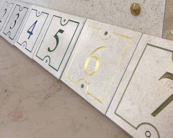 Street number in natural limestone Street number in natural limestone