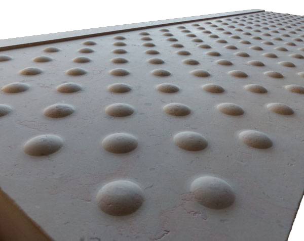 Tactile slab in natural limestone Tactile slab in natural limestone