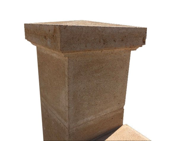 Stone-colored gate pillar