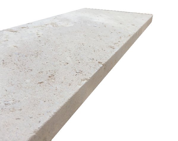 Sloped capstone for wall