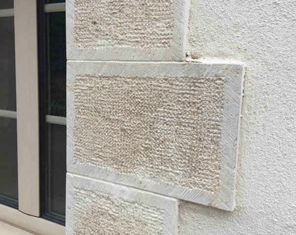 Window cladding in natural limestone Window cladding in natural limestone