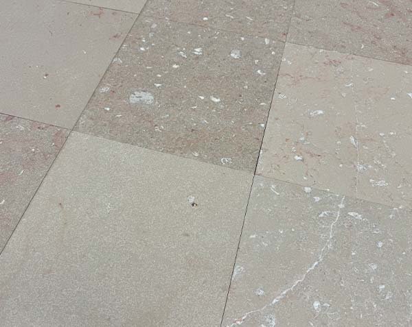 Marble-like stone with a flamed finish