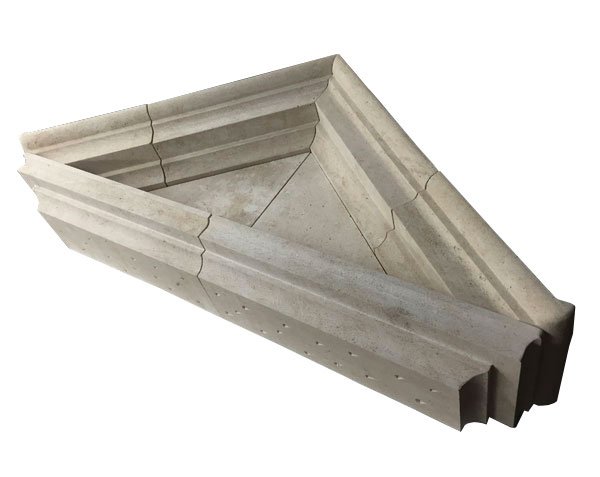 Triangular pediment in solid stone