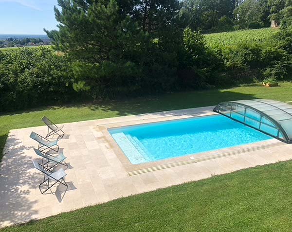 Pool coping stones and outside flooring in Ampilly Blended Limestone