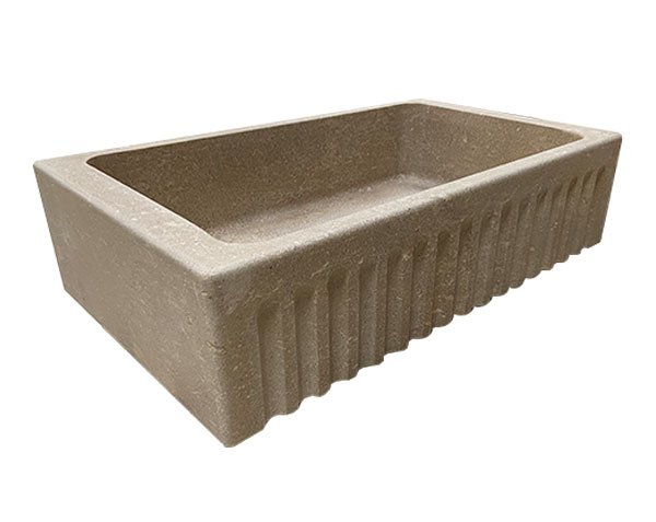 Stone sink with grooves and fluting