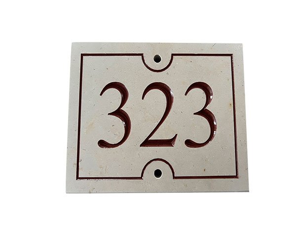 Street number with 3 figures - Burgundy limestone Street number with 3 figures - Burgundy limestone