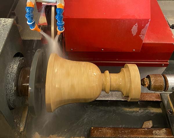 Machining of vase in natural stone