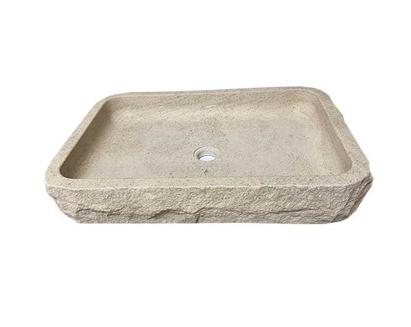 Bathroom with raw rectangular basin in natural Burgundy limestone - Charmot Golden Honed