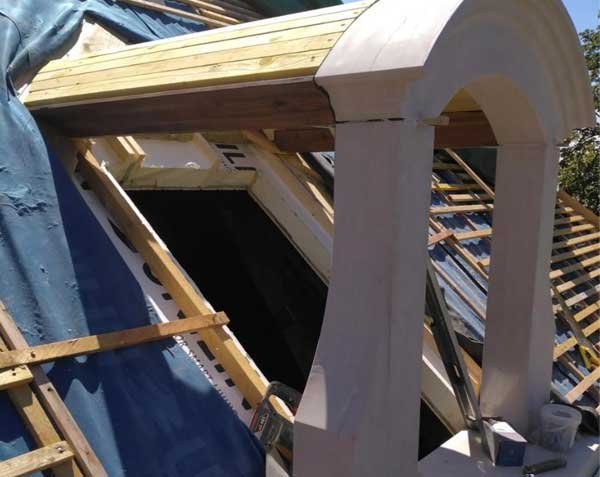 Installation of a stone dormer - Burgundy Roofer