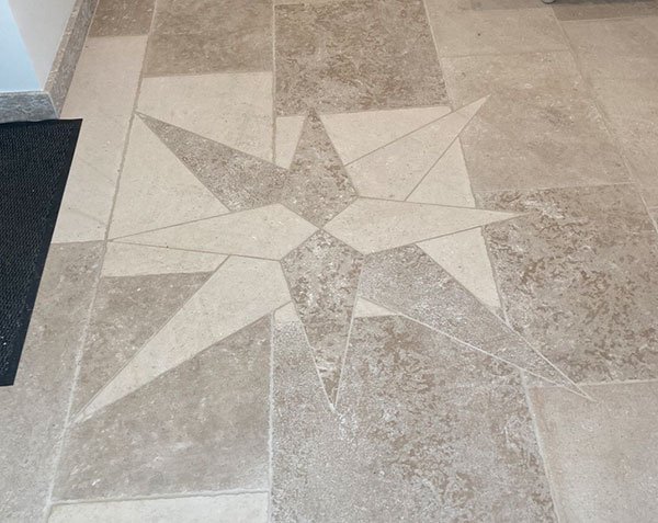 Custom made rose window in Ampilly Burgundy limestone Custom made rose window in Ampilly Burgundy limestone